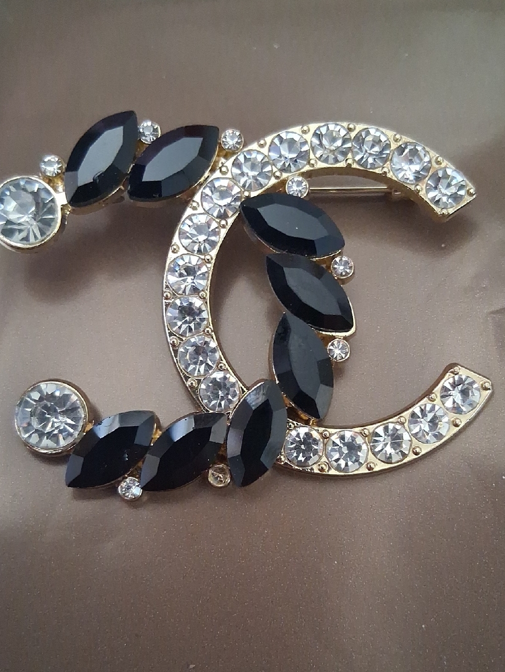 Gold-Tone Black Crystal Double-C Motif Brooch